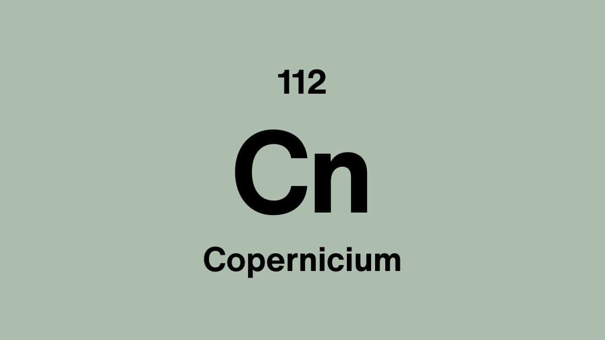 Copernicium element symbol Cn, atomic number 112, on a sage green periodic table tile
