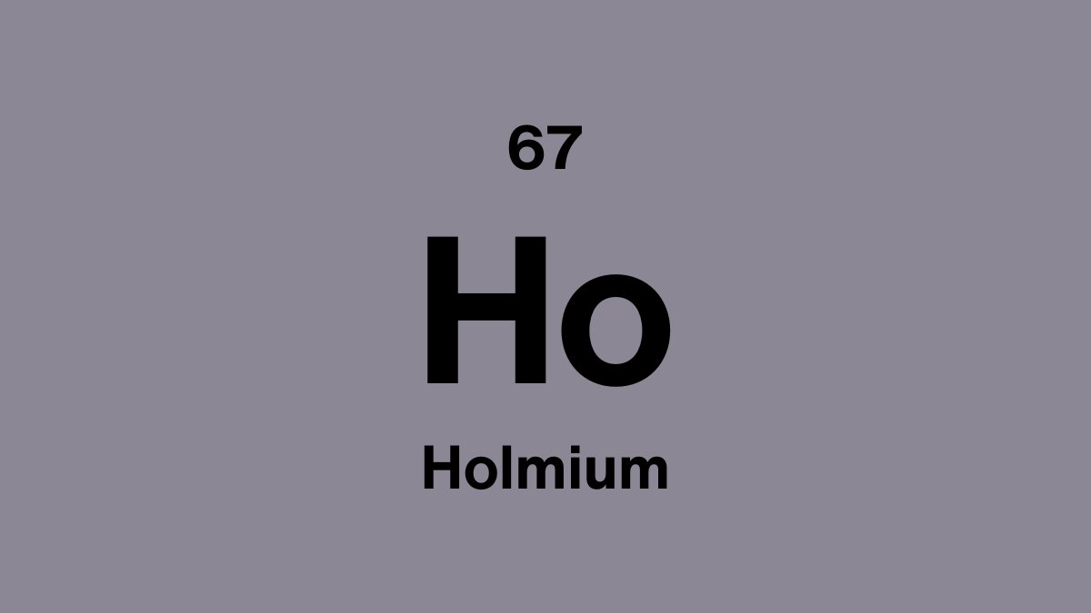 Holmium element symbol Ho, atomic number 67, on a lavender periodic table tile