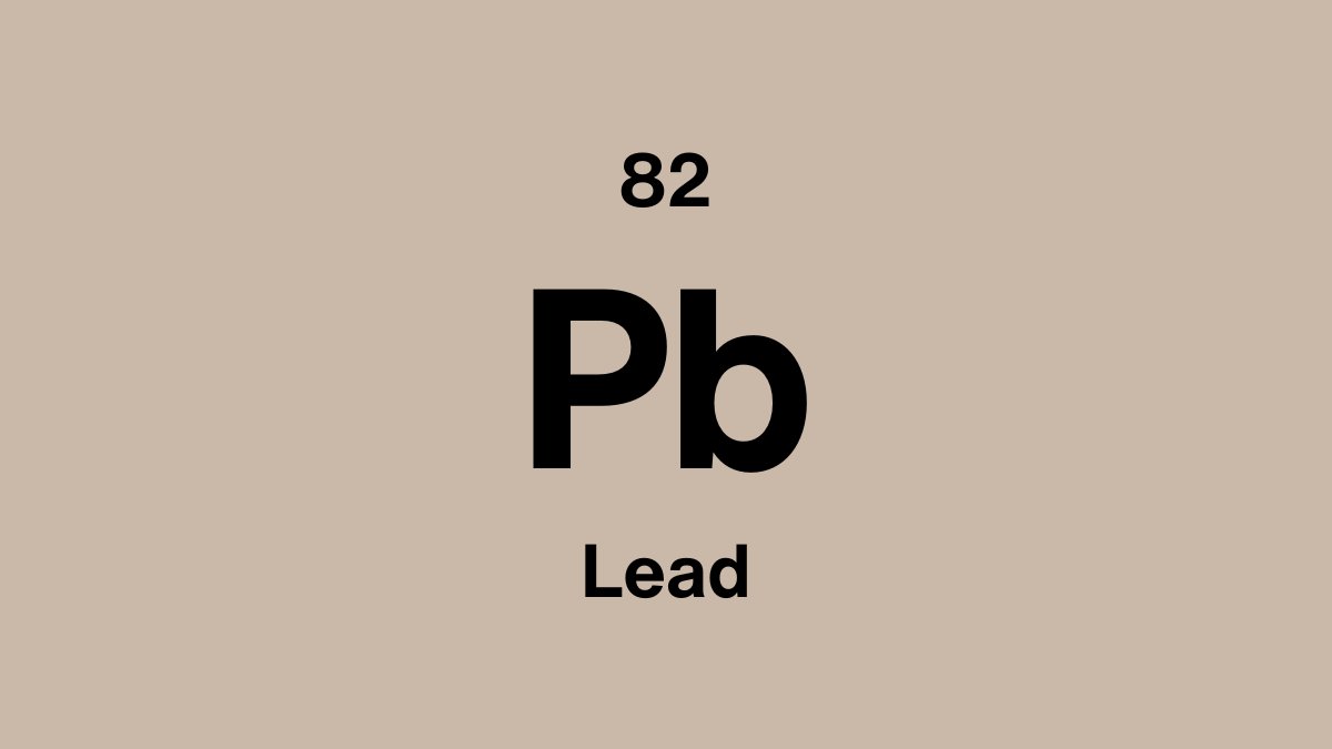Lead element symbol Pb, atomic number 82, on a sand periodic table tile